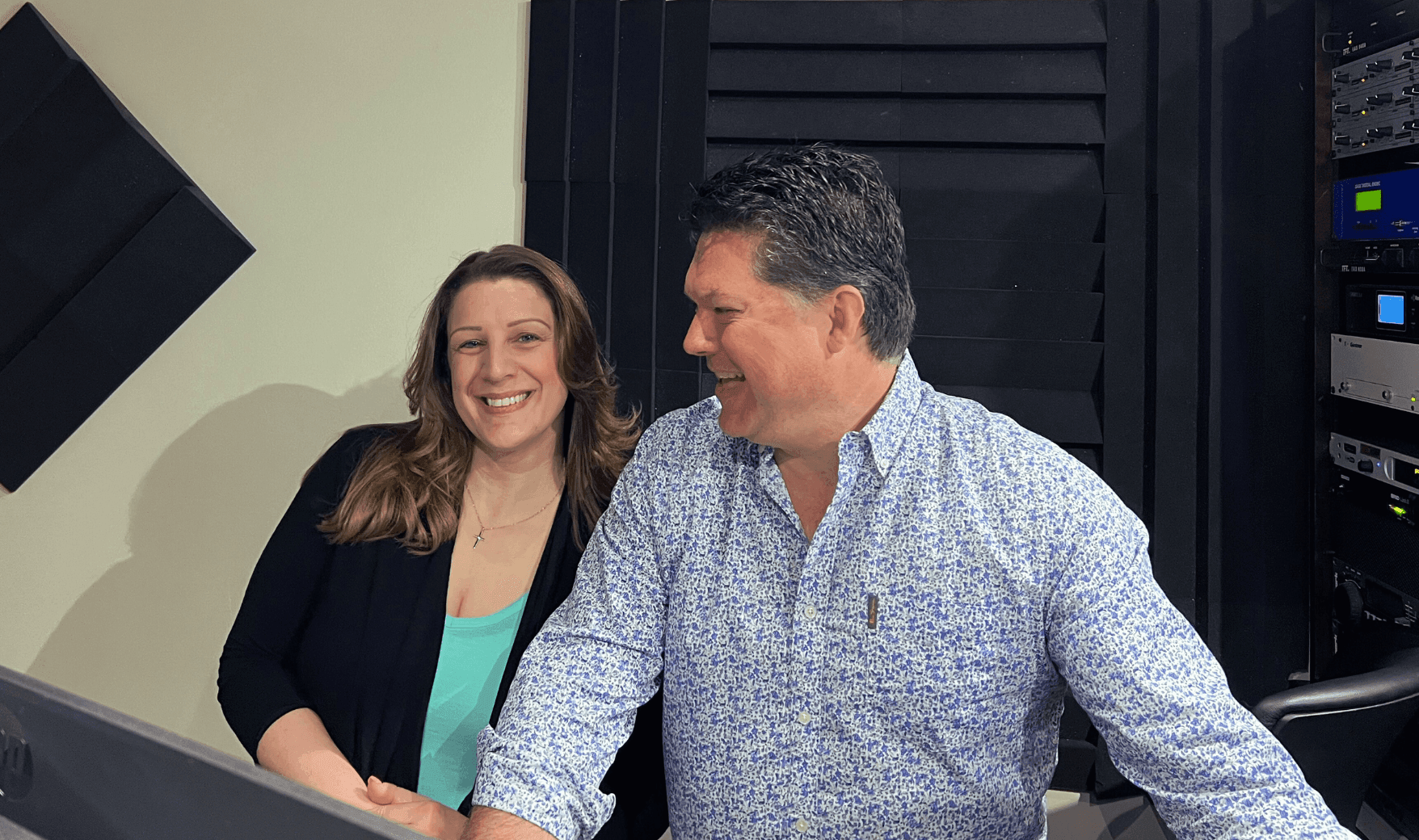 Geoff and Danielle radio in a studio Geoff and Danielle radio in a studio